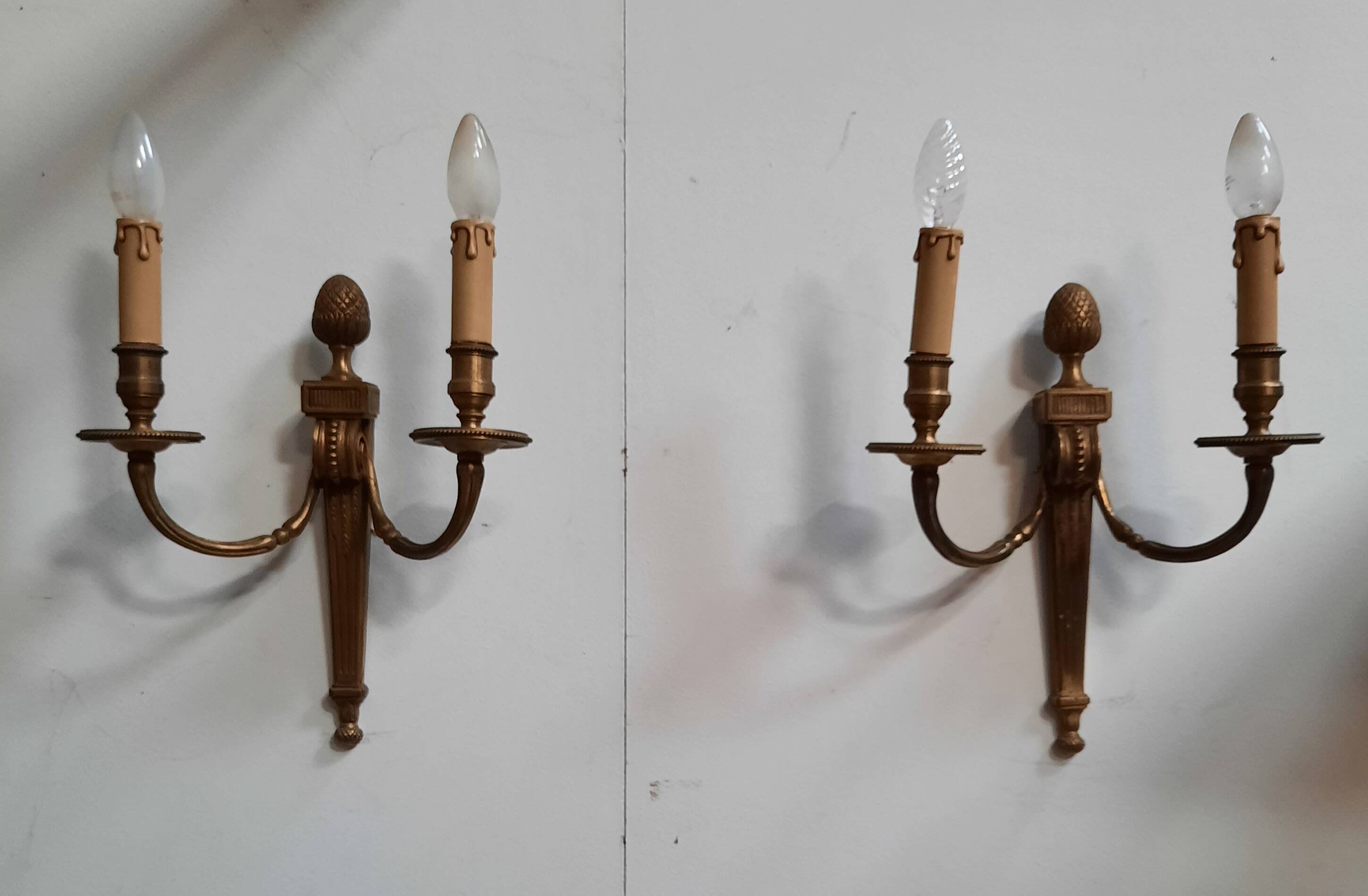 Pair of Louis XVI style bronze wall lights