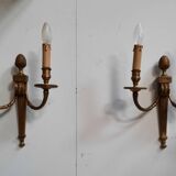 Pair of Louis XVI style bronze wall lights