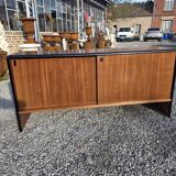 Vintage sideboard with sliding doors from the 60s