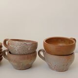 Stoneware coffee service, cups and saucers