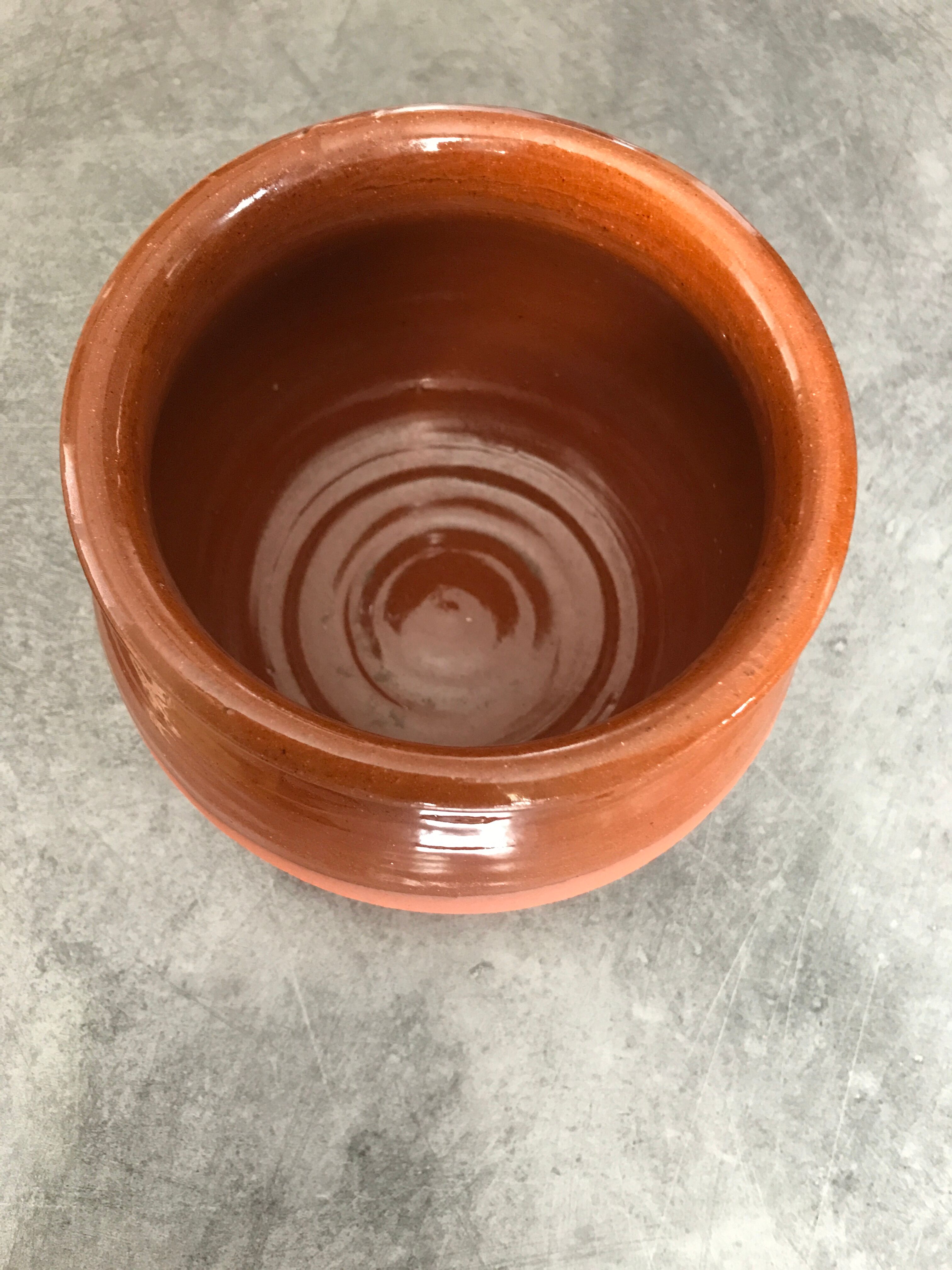 Matt and glazed round earthenware pot