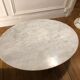 White marble coffee table and steel foot