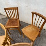 Set of 4 yellow mismatched bistro chairs