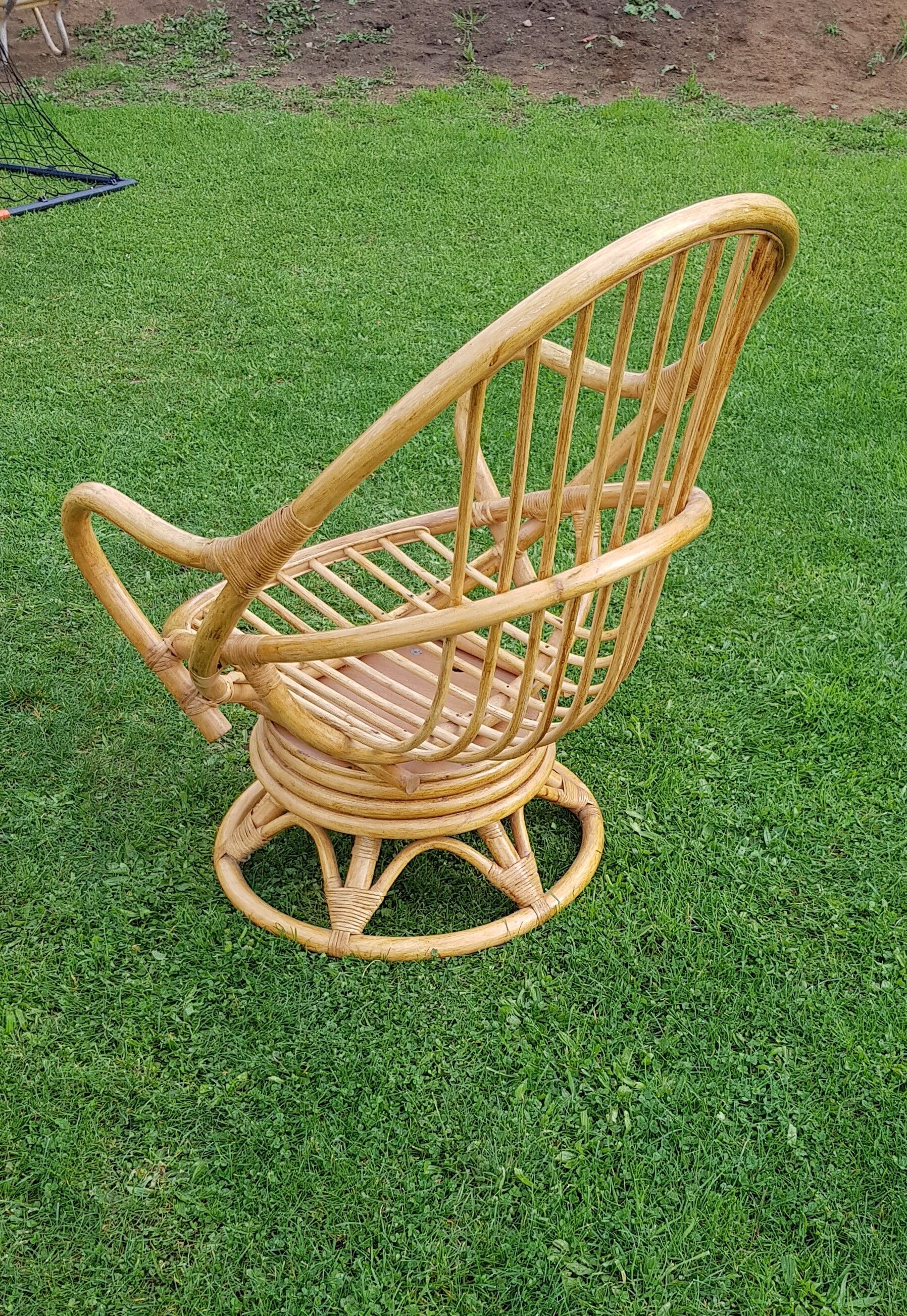 Pair of swivel rattan armchairs