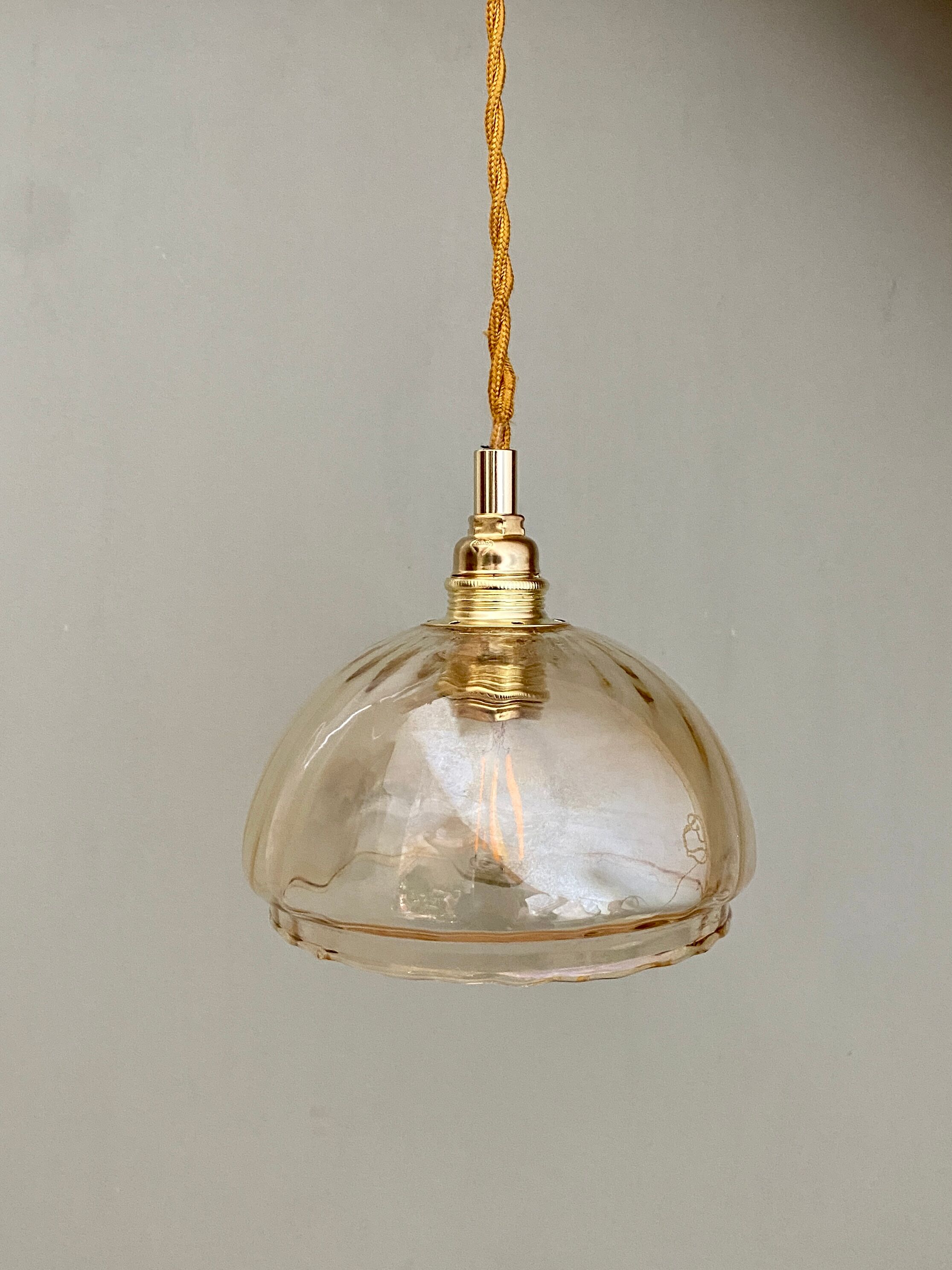 Vintage amber glass globe walker
