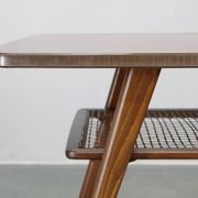 Mid-century German coffee table with rattan shelf and brass legs