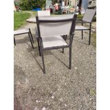 Garden furniture in stone with a vintage 1970s iron base.