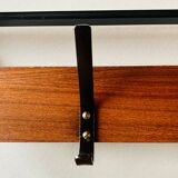 Vintage wall-mounted coat rack in wood and black metal