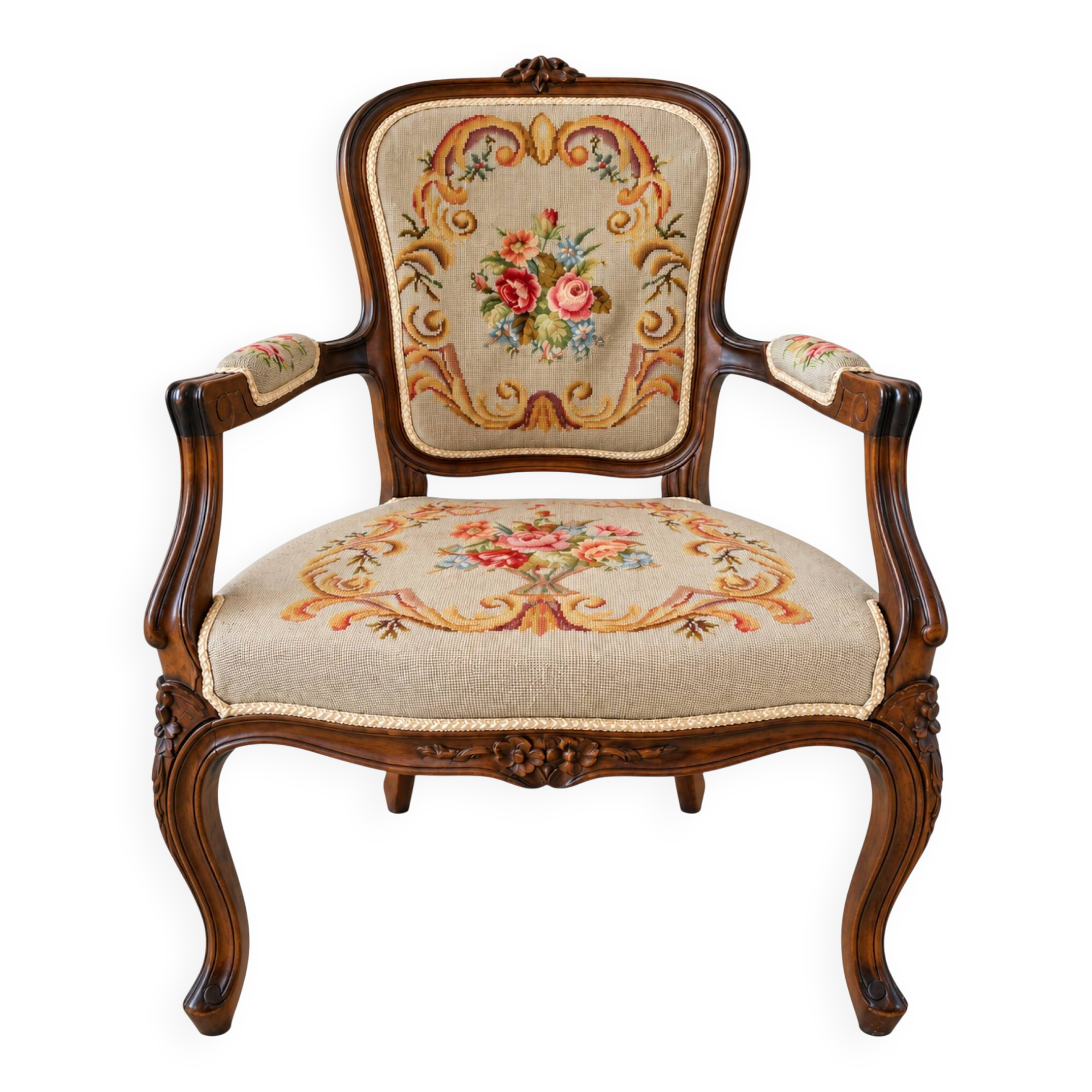 Louis XV style carved wooden armchair with floral needlepoint upholste