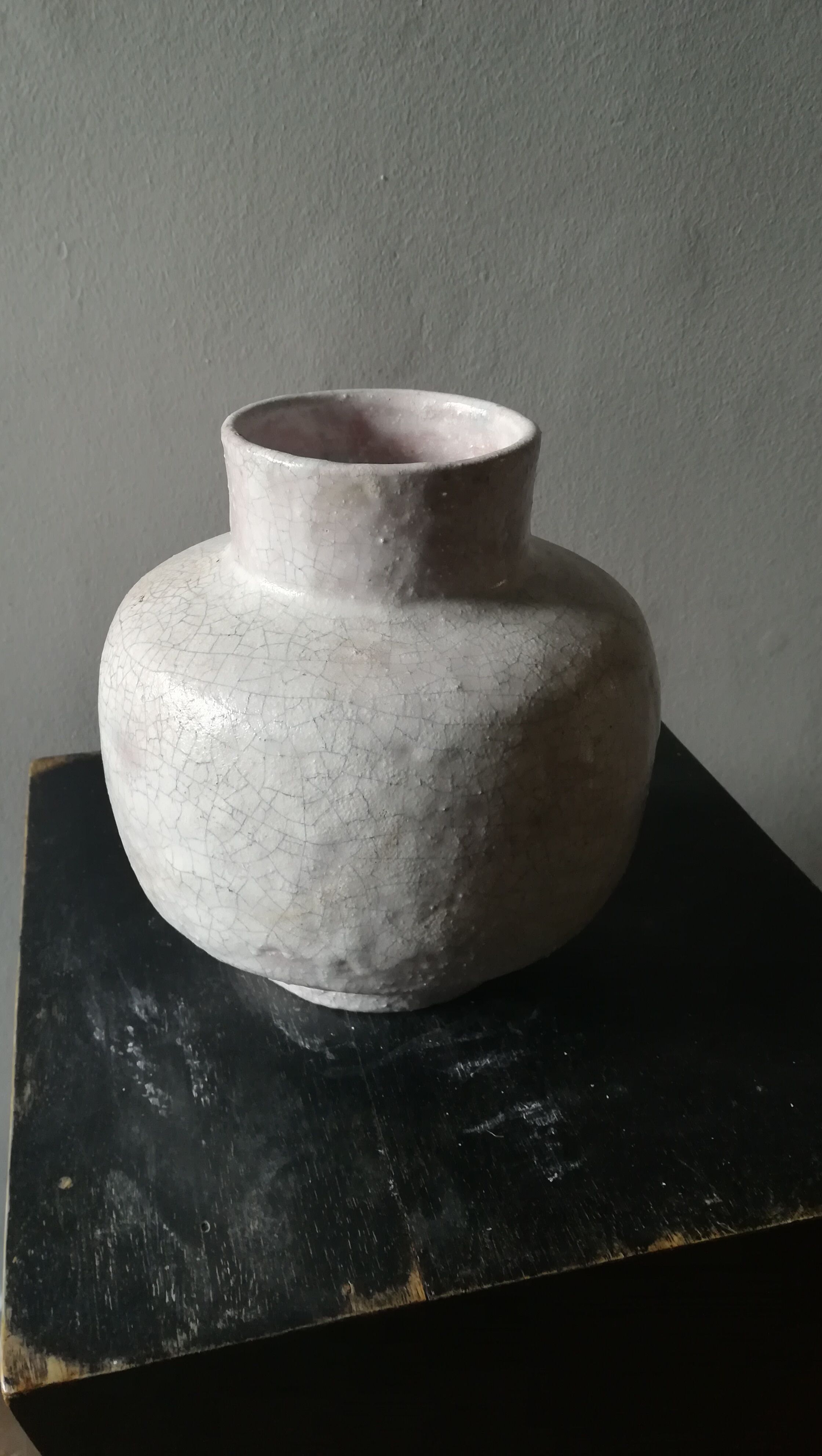 Vase covered white crusty and cracked ceramic,