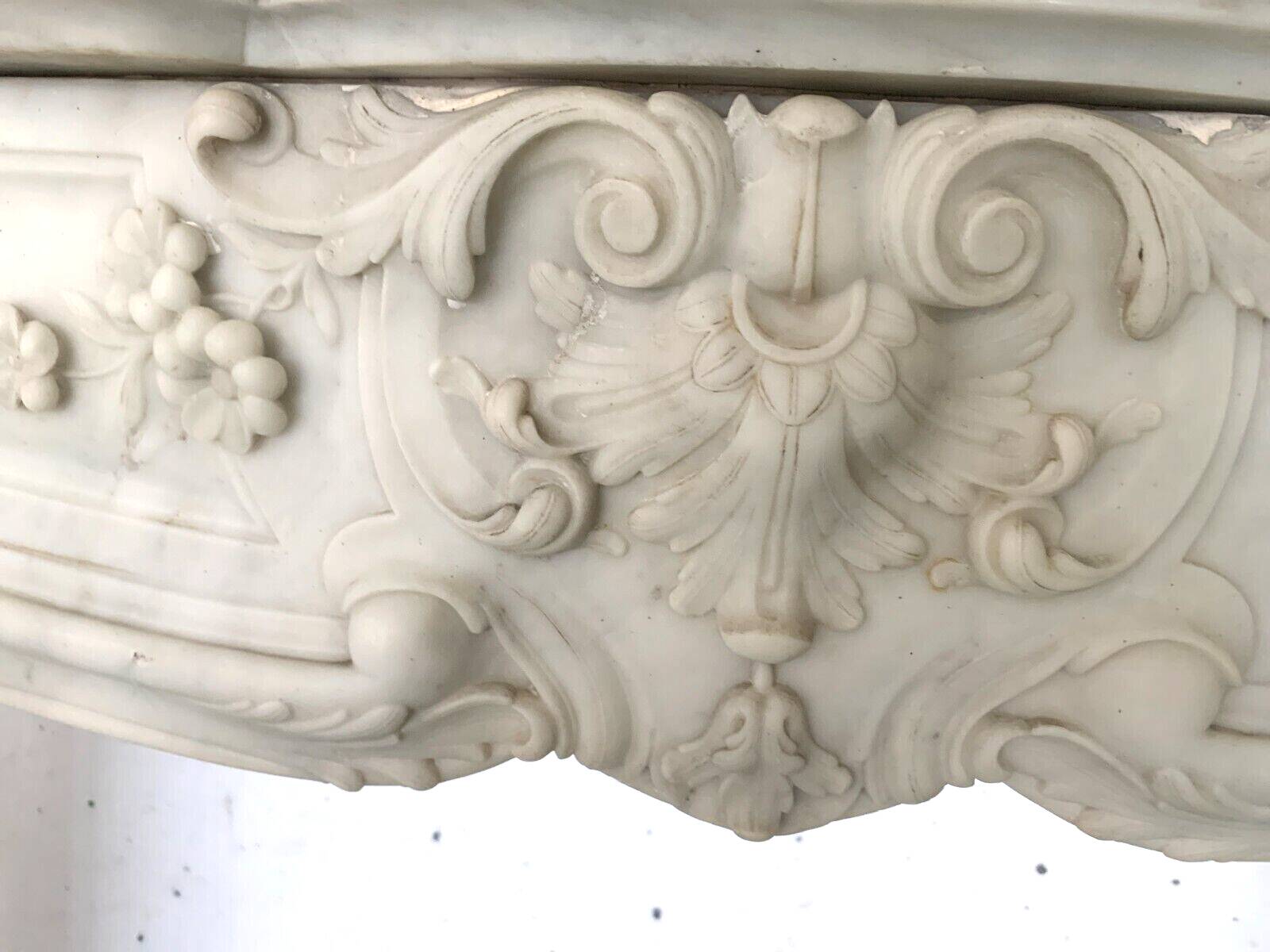 Louis XV style fireplace in white Carrara marble 19th century