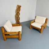 Set of 2 armchairs in solid pine with boucle fabric, 1970s Scandinavian design.
