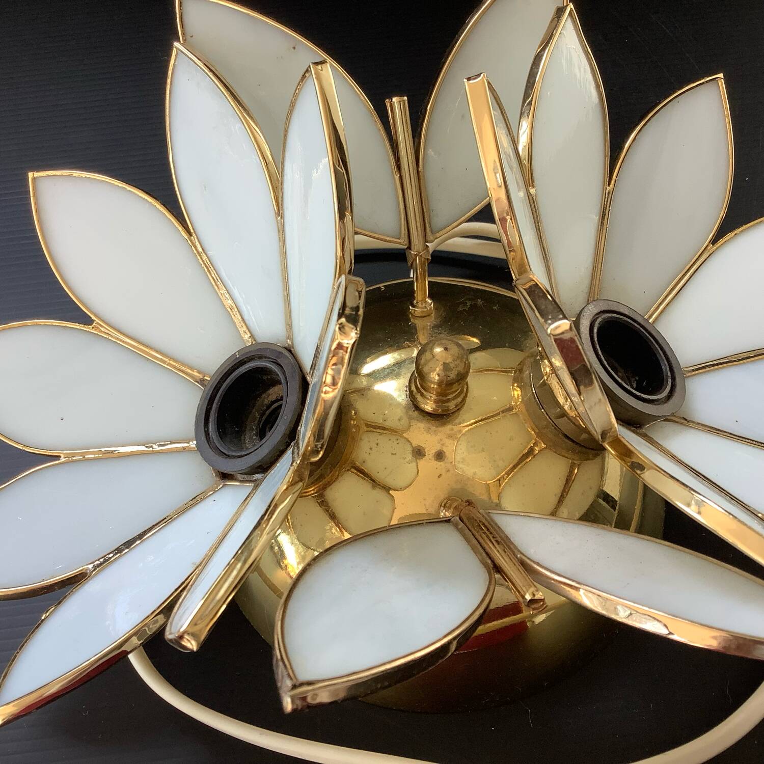 Pair of Hollywood Regency flower sconces in white glass and brass. Italy