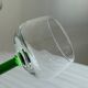 8 Alsatian stemmed glasses, transparent glass and green stems.