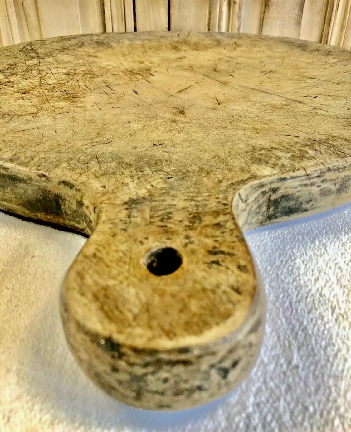 Old large round pizza cutting board