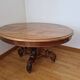 Round walnut table in solid wood, Napoleon III style with extensions - for 14 settings.