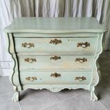 Curved patinated chest of drawers