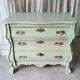 Commode galbée patinée