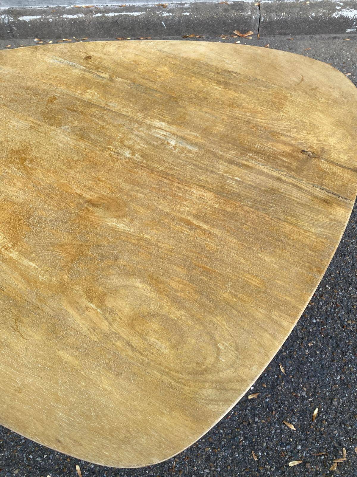 Scandinavian coffee table in the shape of a pebble/bean made of light solid wood from the years.