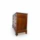 Antique walnut commode with bronze handles in the shape of a lion's mask,