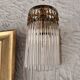 Brass wall light with crystal pendants