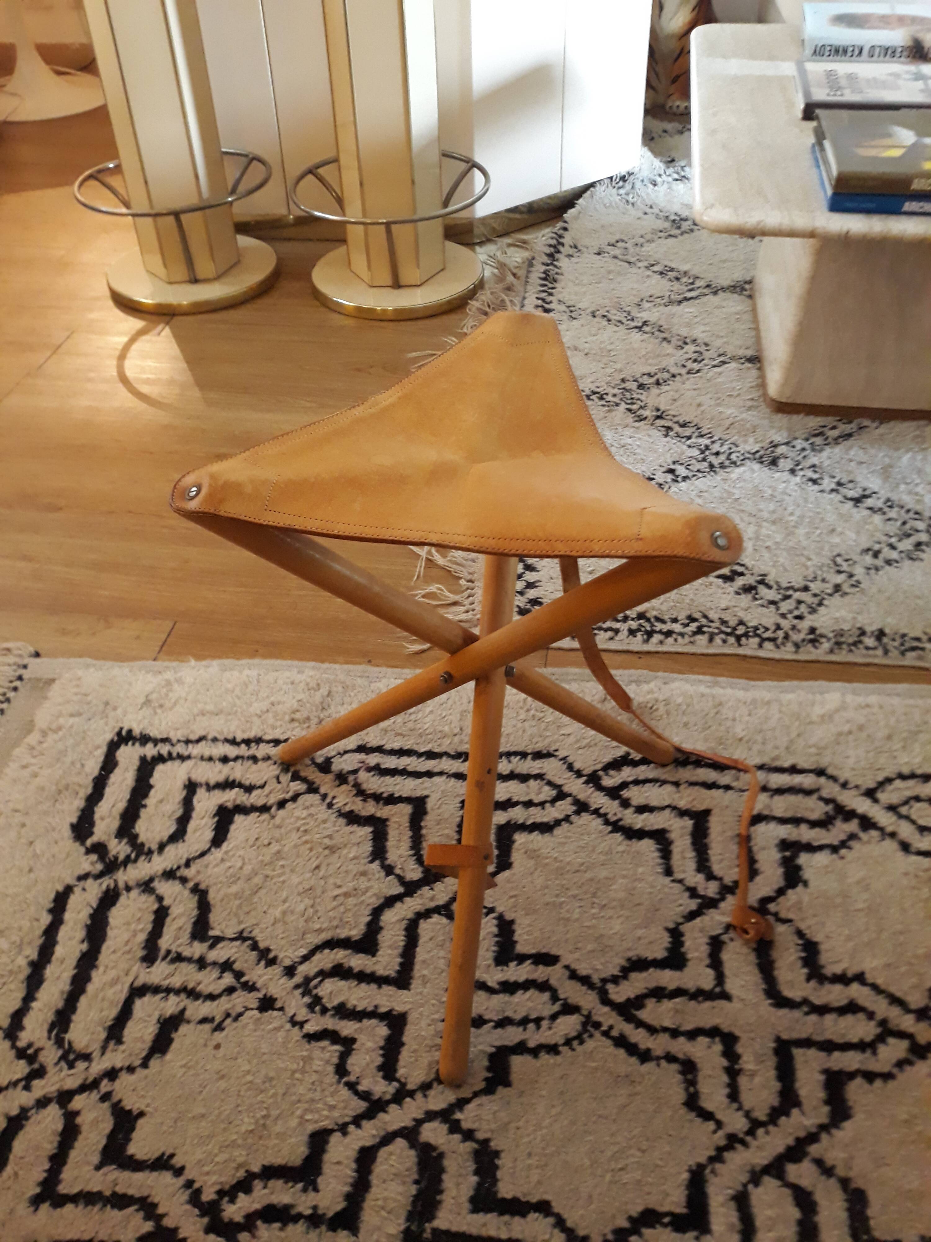 Wooden stool and vintage foldable leather