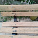 Garden bench with old cast iron legs