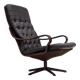 Fauteuil pivotant scandinave des années 1970, en cuir patchwork d'origine.