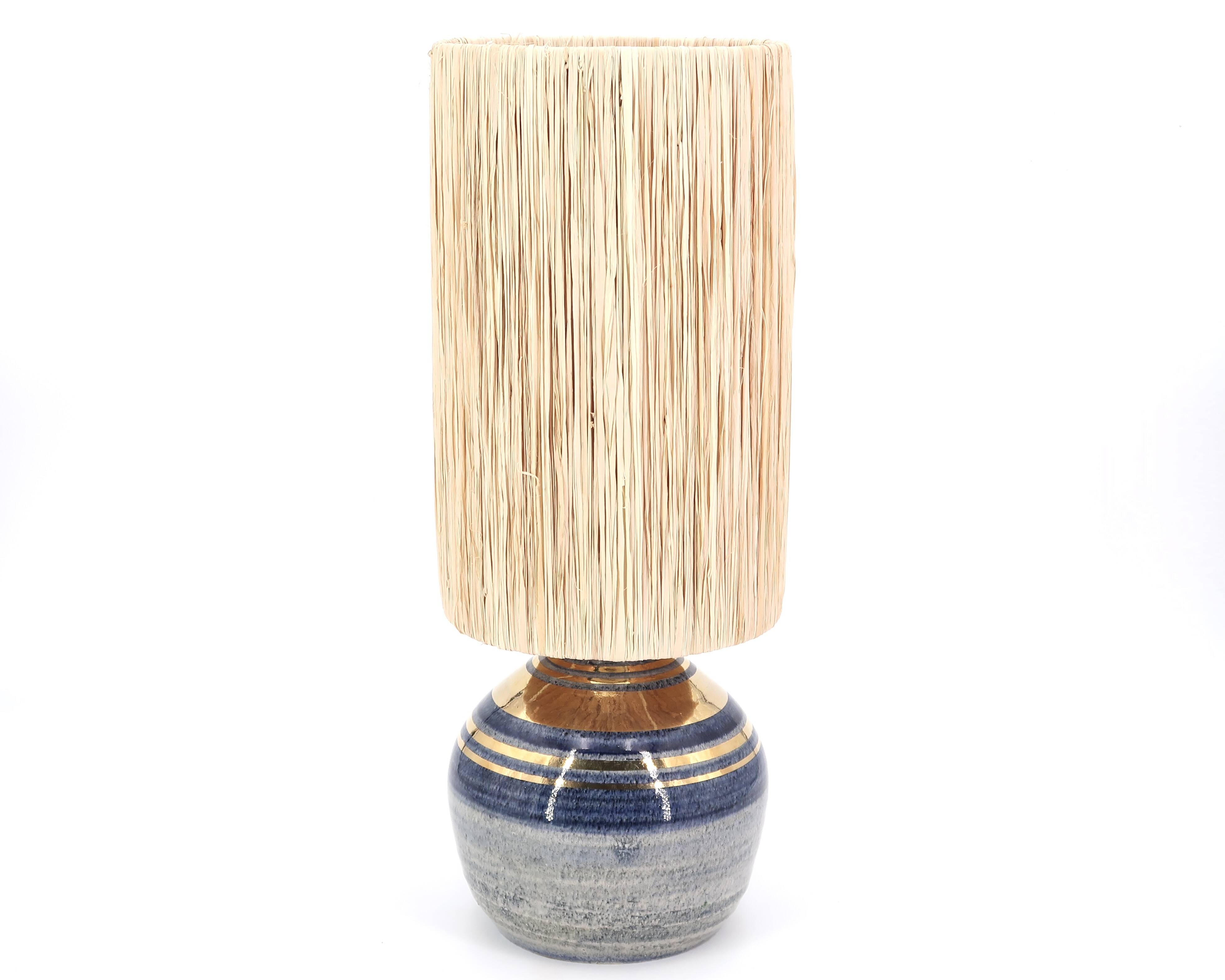 Blue and gold ceramic lamp by Georges Pelletier, raffia lampshade