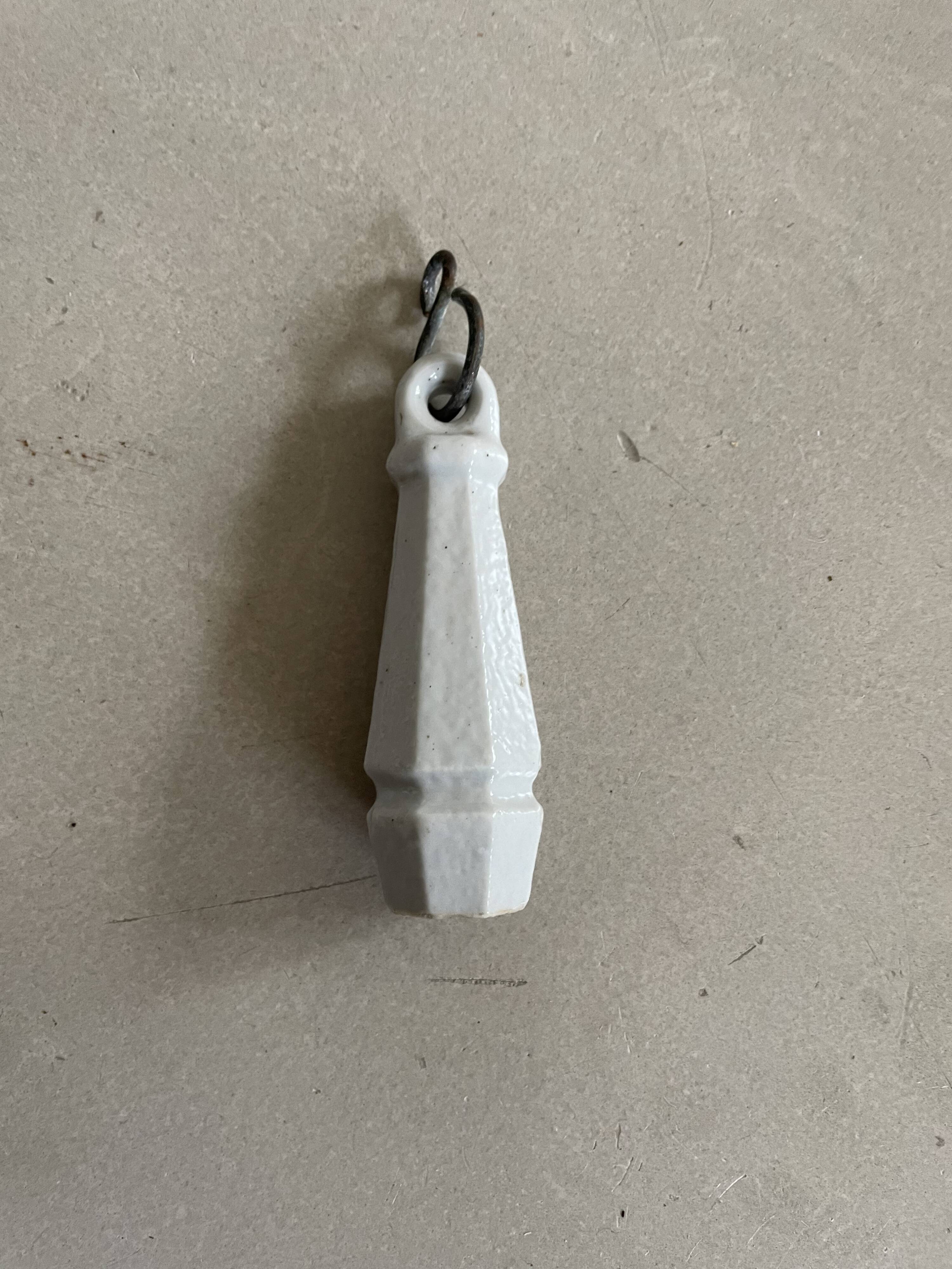 Ceramic flush handle