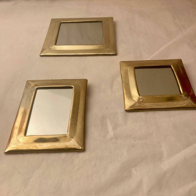 Brass mirror composition