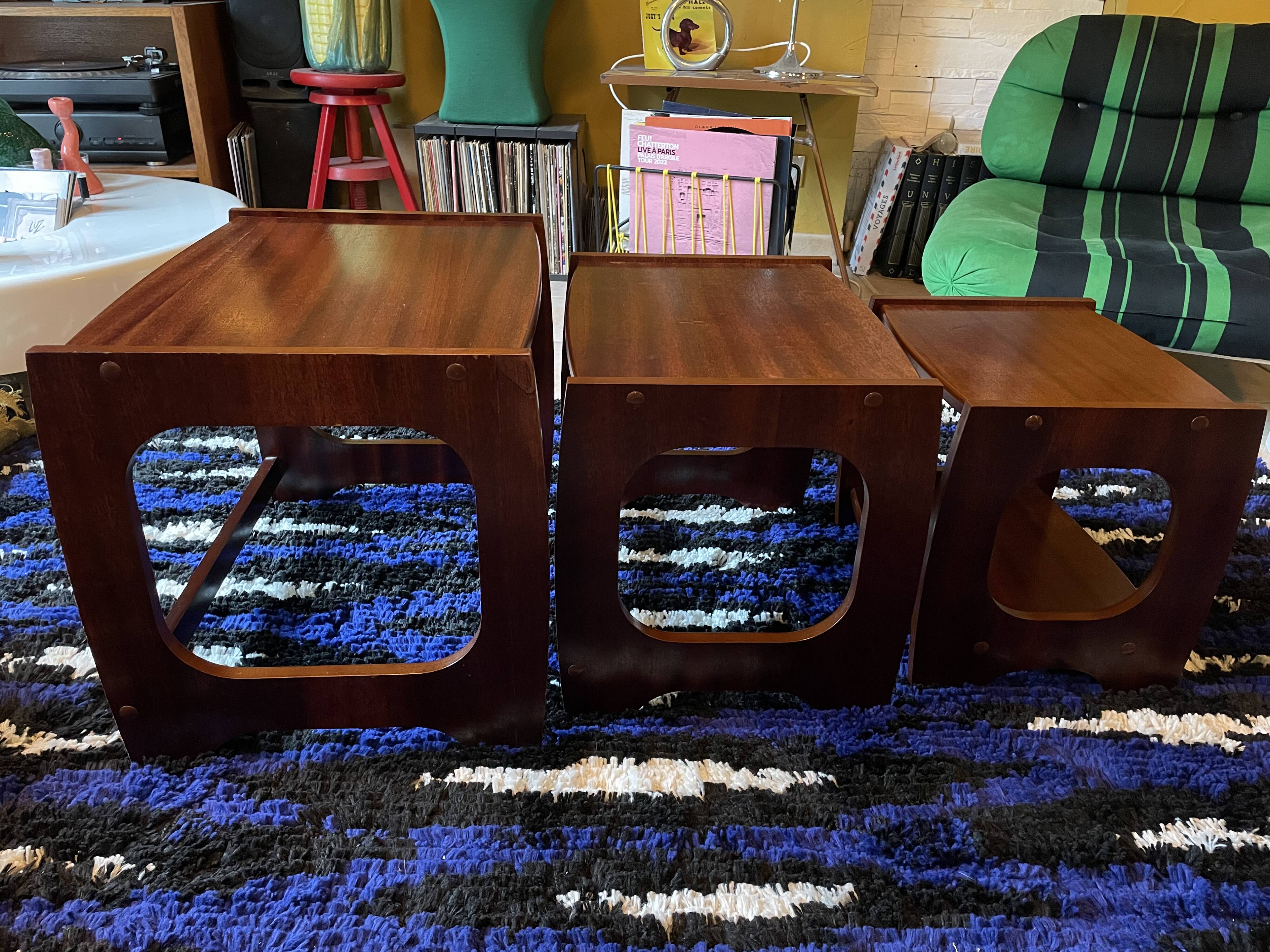 Set of three nesting coffee tables, 1970, dark wood.