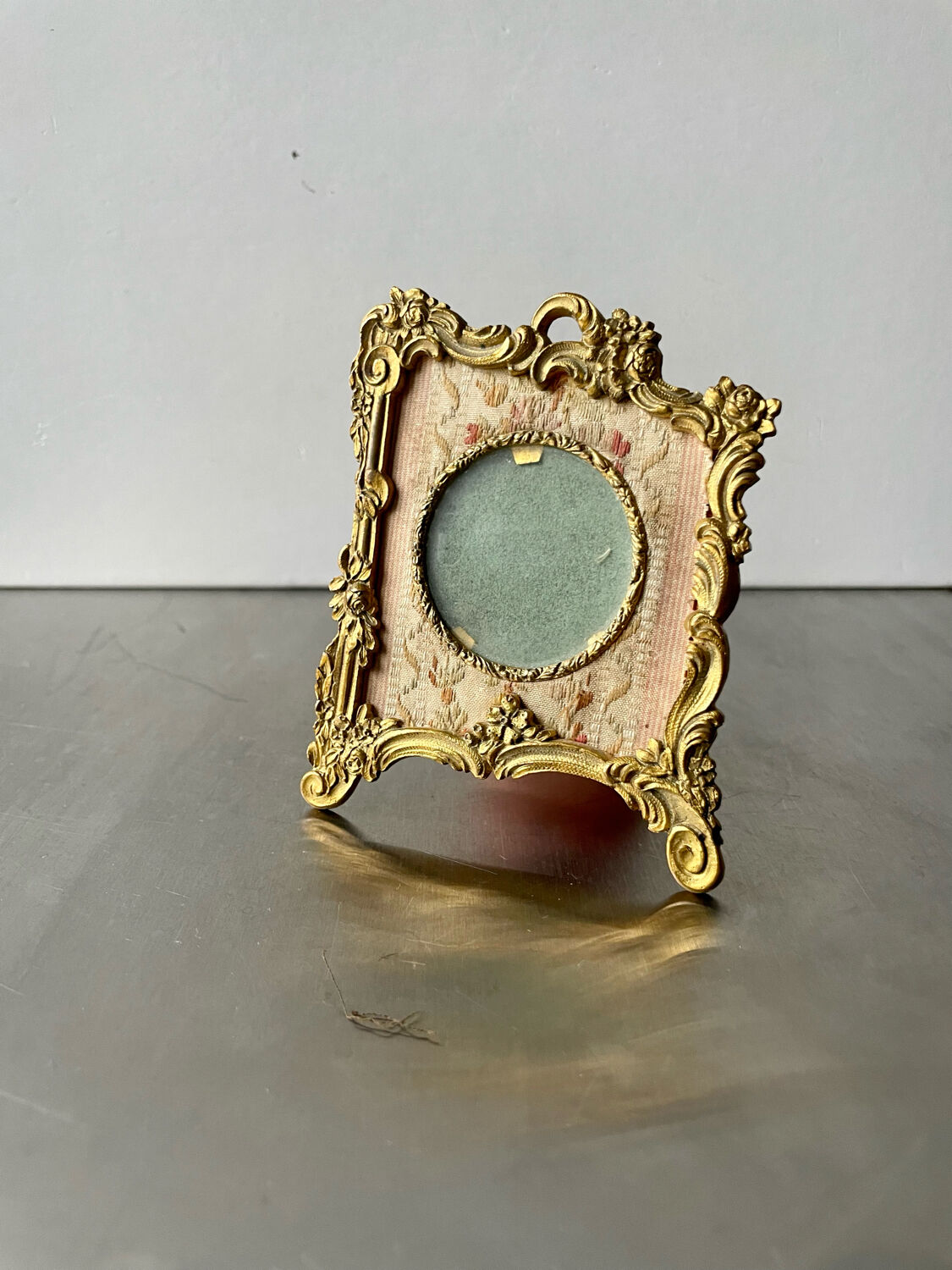 Metal gold colored picture frame brass