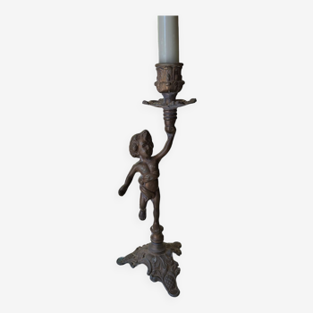 Pewter gray cherub candle holder.