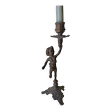 Pewter gray cherub candle holder.