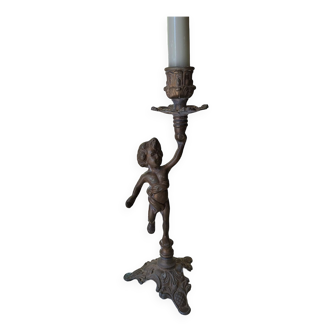 Pewter gray cherub candle holder.
