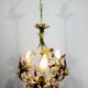 Lustre en fer forgé et porcelaine