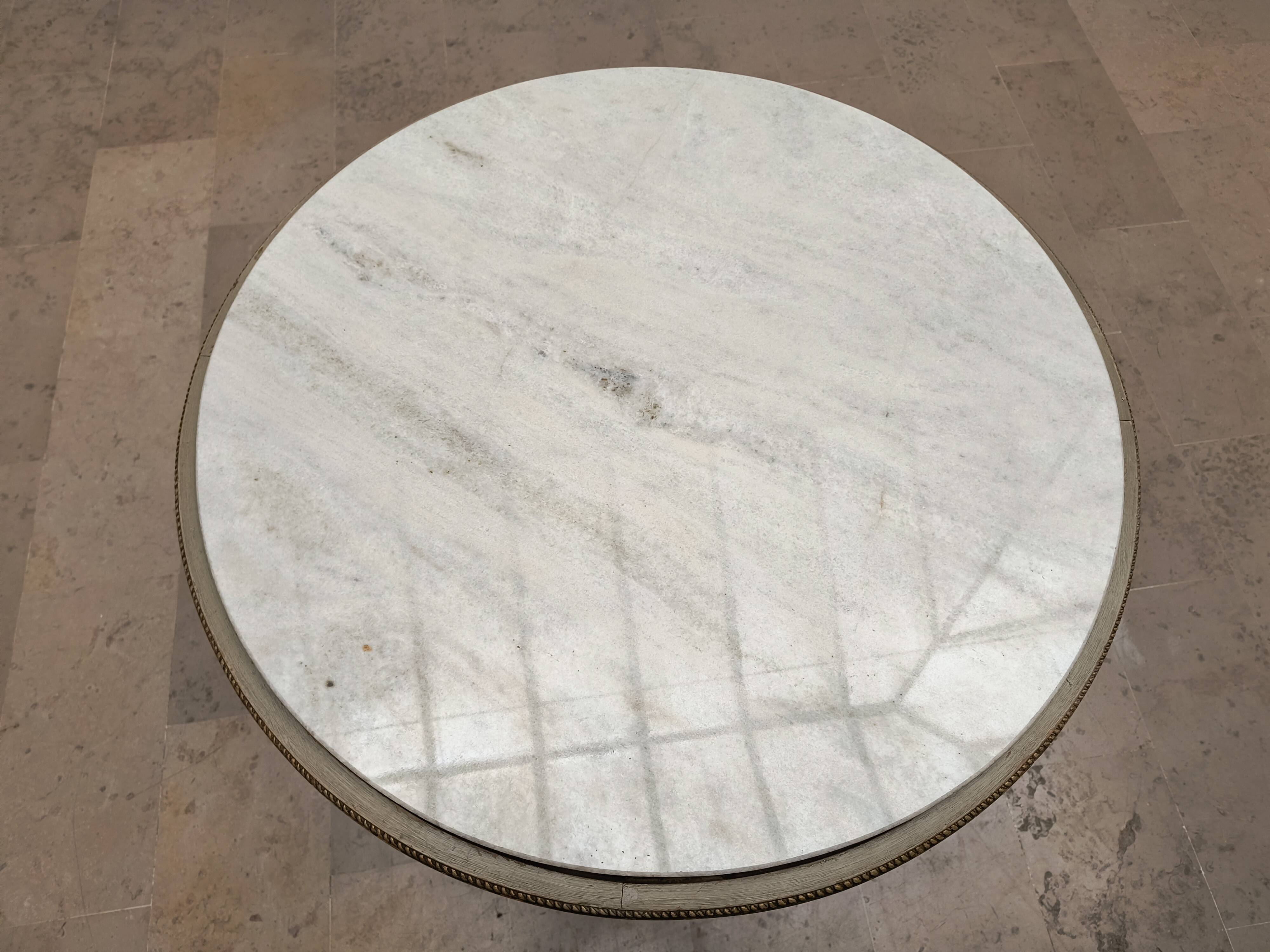 Louis XVI table with carved wood and Carrara marble.