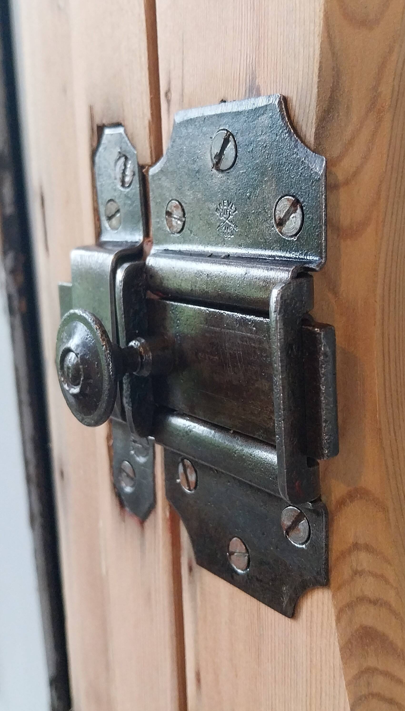 Old bullseye window with oval glass