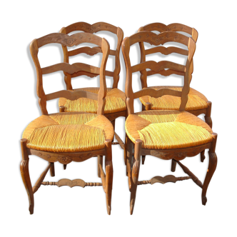 Set of 4 chairs in oak carved from 1950