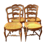 Série de 4 chaises en chene sculpté de 1950