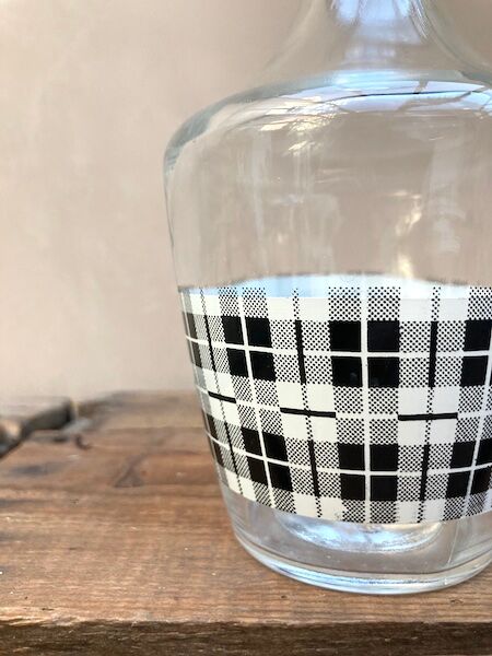 Vintage decanter with black and white tiles