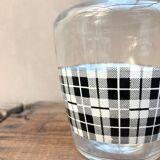 Vintage decanter with black and white tiles
