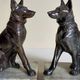 Pair of Art Deco bookends to signed wolf dogs