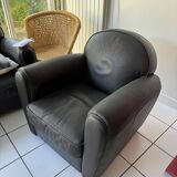 Matching black leather armchair – comfort and elegance