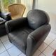 Matching black leather armchair – comfort and elegance