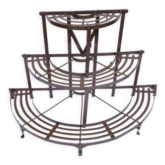 Half-moon plant holder in wrought iron