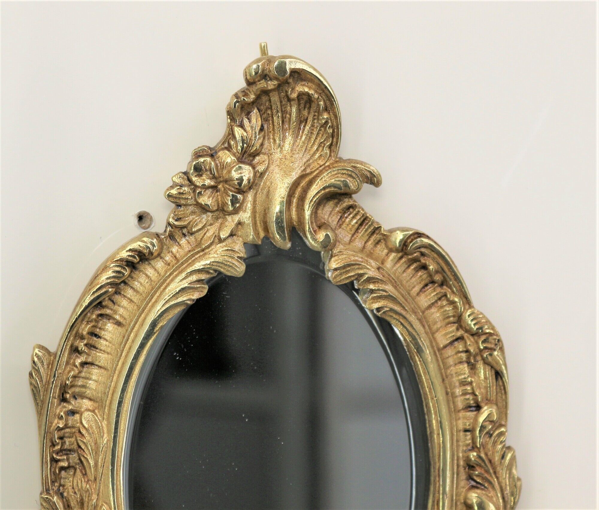 Pair of louis XV beveled mirror wall lamps in bronze by "Lucien Gau"
