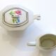 Ancient milk pot and sugar bowl in earthenware decorated with ancient roses