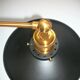 Pair of metal wall lamps in black and gold